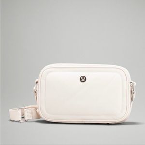 Lightly used white opal lululemon crossbody camera bag 2L